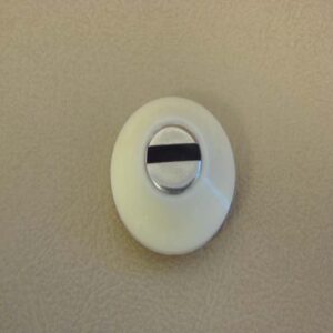 B06082D Glove Box Lock Bezel, White